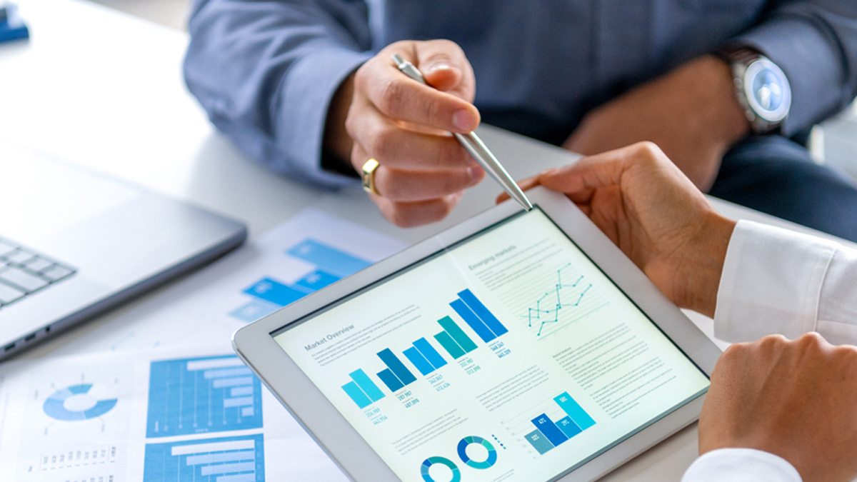 Close up of a tablet showing charts and graphs.